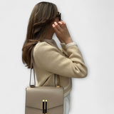 Klasična pletena jakna s ukrasnim džepovima